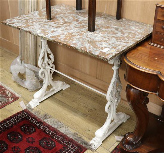 A cast iron table with marble top W.92cm